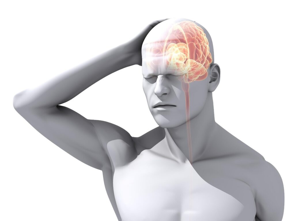 A man experiencing headaches with a brain on his head.