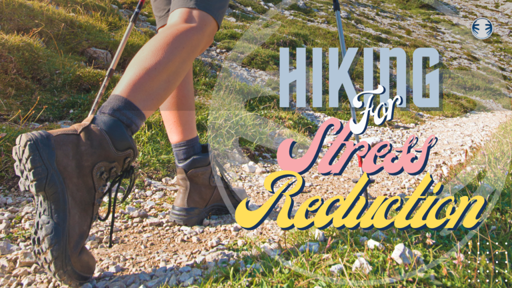 Close-up of a person hiking on a rocky trail, with the text "Hiking For Stress Reduction" overlaid in bold letters. The hiker wears brown boots and uses trekking poles, showcasing how outdoor activities like hiking can complement chiropractic care for overall well-being.